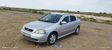 tirə cəkən: Opel Astra: 1.8 l | 1998 il 296000 km Hetçbek — 12