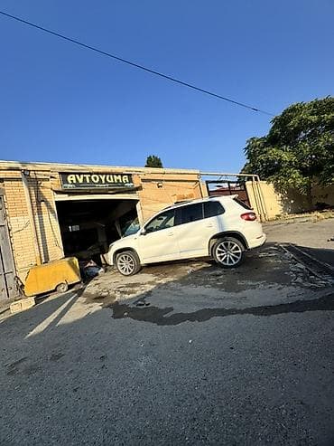 sam diskiler: Volkswagen Tiguan: 2 l | 2011 il Krossover — 3