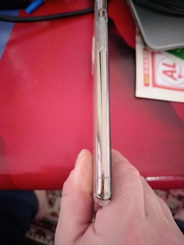 Samsung Galaxy A04s arxa qapağı (batareya qapağı) – gümüş/boz rəngdə — 1