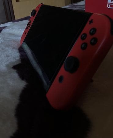 xiaomi tab: Nintendo Switch OLED – Mario Red Edition Xüsusiyyətlər: - 7 düymlük — 6