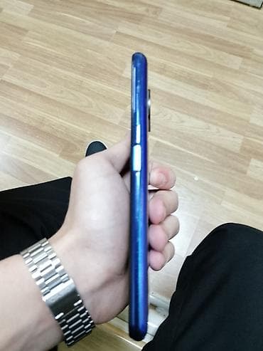 TV və video: Mavi rəngli smartfon Xüsusiyyətlər: - Arxa tərəfdə çoxmodullu kamera — 4