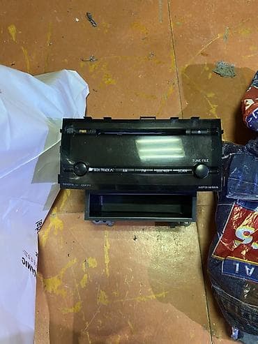 mp 3 player: Maqnitol, CD — 1