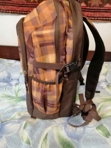 qruz nə deməkdir: Şəhər istifadəsi üçün nəzərdə tutulmuş bu uniseks bel çantası qəhvəyi — 3