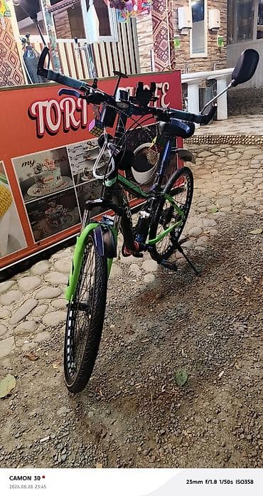 elektro gitara satışı: Yaşıl-qara rəngli şəhər/trek tipli velosiped. Velosiped uzadılmış — 1