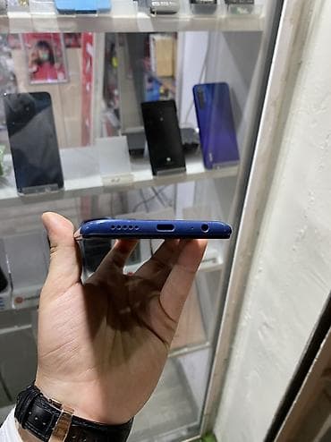 Xiaomi Mi 9, 64 GB — 2
