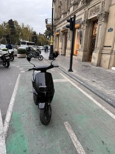 электро мотоцикл: Elektrik skuter – şəhər içi sürüş üçün ideal, kompakt və səssiz. 2000w — 2