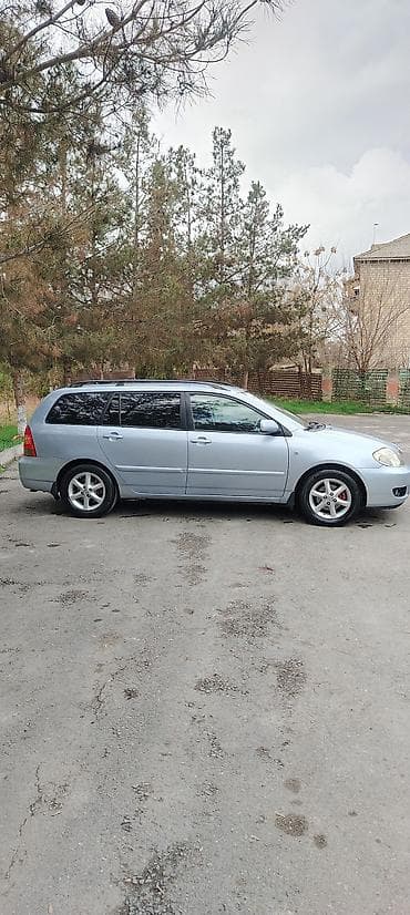 1.5 dizel renault motoru: Toyota Corolla (Avensis Verso deyil), universal kuzov, gümüşü rəng — 6