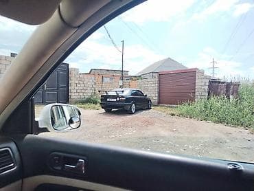 BMW sedan – idman üslublu tüninqlə - Korpus: qara rəngli 4 qapılı — 2