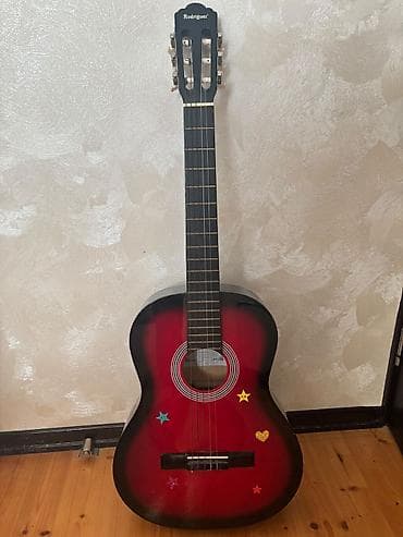 electro gitara: Klassik gitara, İşlənmiş, Ünvandan götürmə — 2