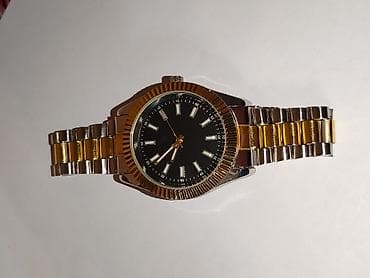 Zərgərlik əşyaları: İkirəngli metal qol saatı - Korpus və qolbaq: paslanmayan polad — 1