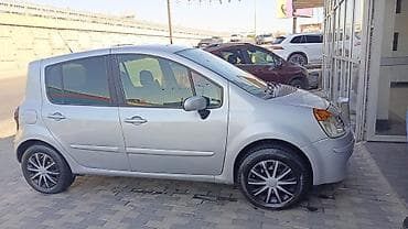 maşınlar avtomobil: Renault Modus, gümüşü rəng, 5 qapı, kompakt monovolumen kuzov — 4