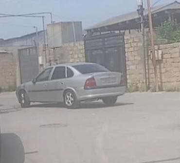 Opel Vectra sedan – gümüşü rəng Avtomat karopqa 1996ci il ön guzguler