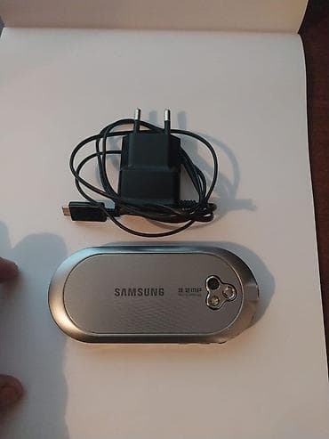 bluetooth: Samsung M7600 Beat DJ, rəng - Gümüşü, Sensor — 1