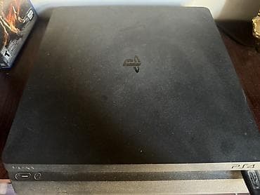 playstation 4 pro 2tb: PlayStation 4 Slim konsolu + disklər Məhsul təsviri: - Sony — 1