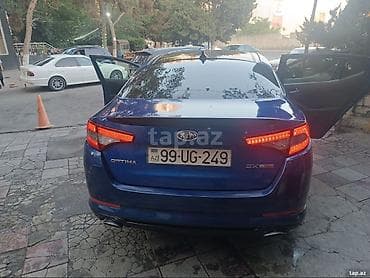 Продажа авто: Kia Optima SX T-GDI, mavi rəngli sedan. Xarici: - Parlaq mavi kuzov — 2