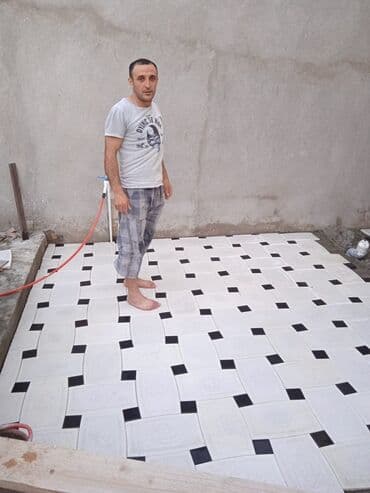 Tamet ustası Tamet daşlarının keyfiyyətli şəkildə yerə vurulması zəng