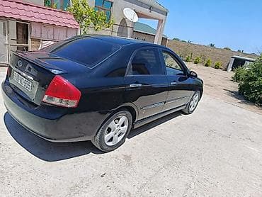 tank pro: Kia Cerato: 1.6 l | 2007 il Sedan — 4