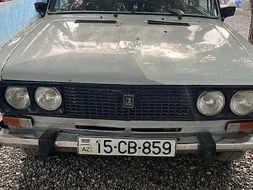 VAZ 2106, ağ rəng, sedandır. Mühərrik benzinlidir, mexaniki sürətlər