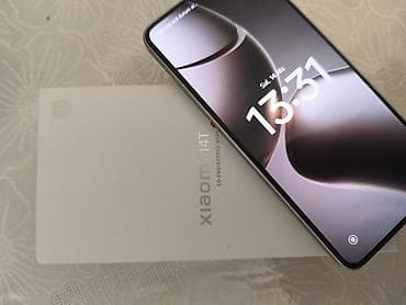 Мобильные телефоны и аксессуары: Xiaomi 14T, 256 ГБ, цвет - Серый, 
 Отпечаток пальца — 1