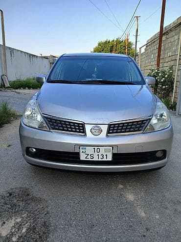 Nissan Tiida: 1.6 l | 2007 il Sedan — 6