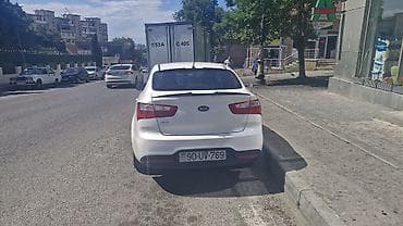 Nəqliyyat: Kia Rio: 1.4 l | 2014 il Sedan — 4