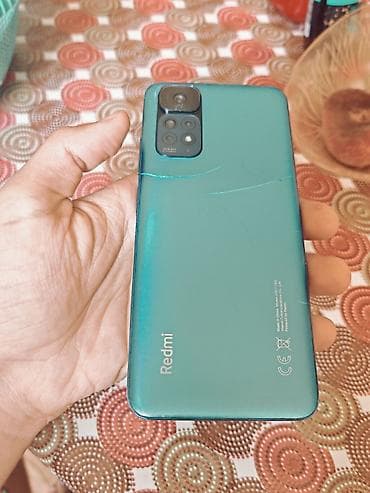 adapdir: Redmi 128 GB, rəng - Mavi, Barmaq izi — 1