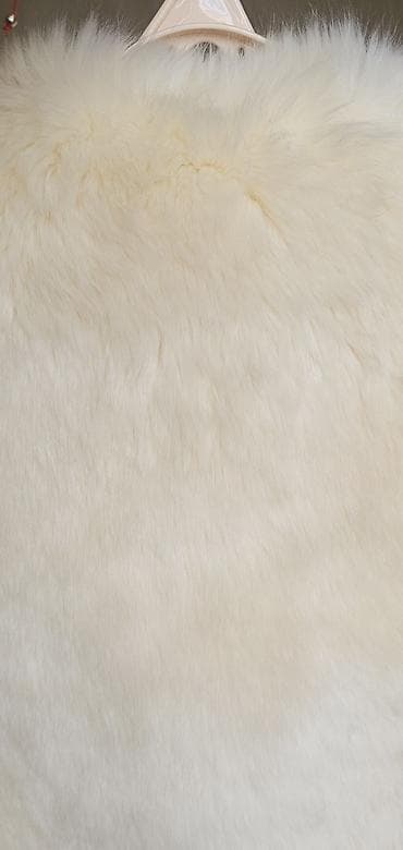 corab toxuma: Fil sümüyü rəngli süni kürk jilet, yenidir. Ölçü= M/L ölçülərinə — 3