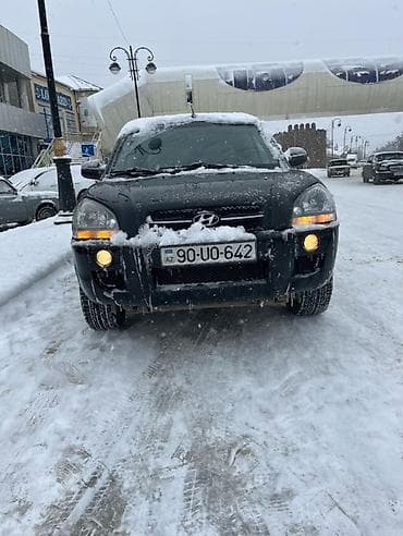 kia rio manitor: Hyundai Tucson: 2 l | 2005 il Ofrouder/SUV — 7