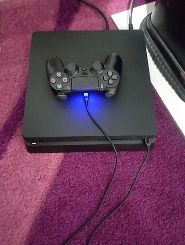 playstation super slim: Sony PlayStation 4 Slim oyun konsolu - Model: PS4 Slim (üzərində — 2