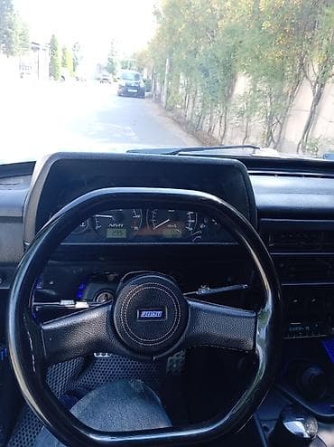 oturacaq vaz: Lada Niva (VAZ 2121) – mavi rəngli, 3 qapılı off-road SUV — 9
