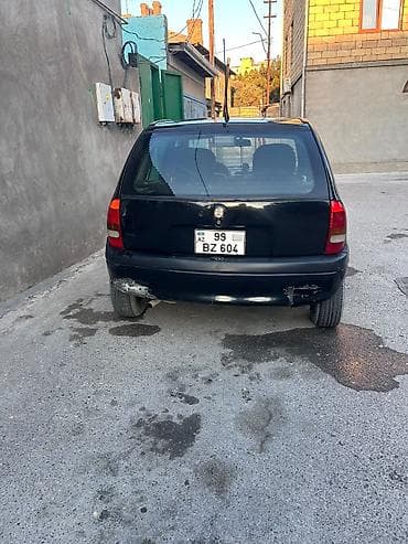 cone cors: Opel Vita: 1.4 l | 1999 il 20000 km Hetçbek — 2