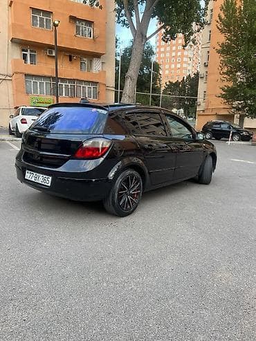 sam diskiler: Marka/model: Opel Astra H (hatchback, 5 qapı) Rəng: qara (parlaq) — 7