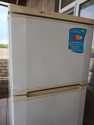ağ qulaq: NORD ikiqapılı soyuducu - Üstdə dondurucu, altda soyuducu bölmə - — 2