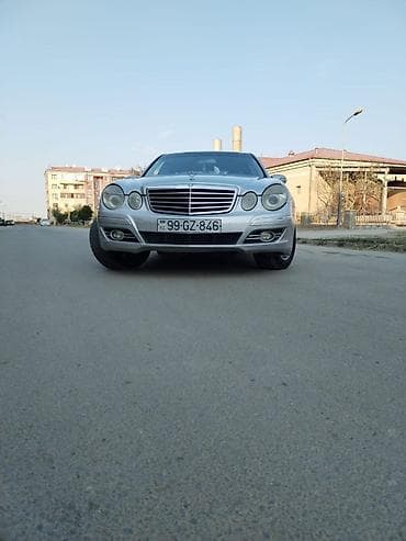 2000 bmw 320i: Mercedes-Benz E-Class: 2.7 l | 2002 il Sedan — 1