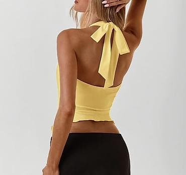 iyde parfum instagram: Sarı rəngli qadın topu - Dizayn: Dərin V-yaxa, halter tipli boğazdan — 3