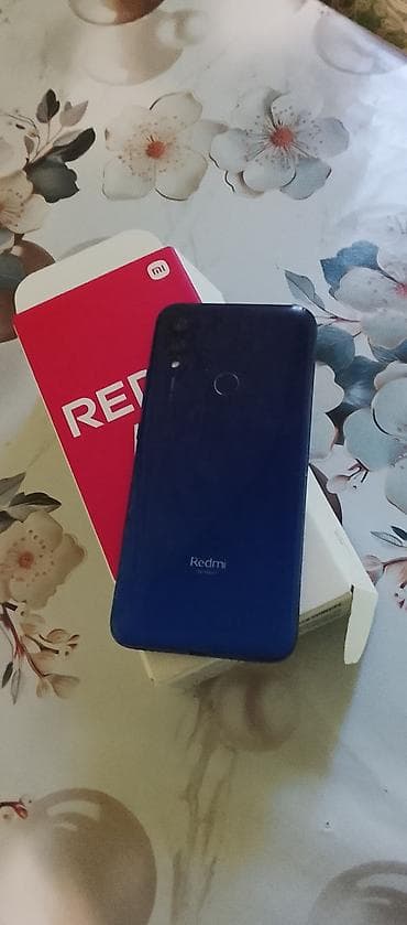 телефон fly e: Redmi 7A, 32 ГБ, цвет - Синий, Отпечаток пальца — 1