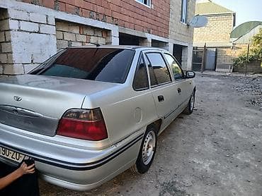 panel vurmaq: Daewoo Nexia sedan – gümüşü rəng Xüsusiyyətlər: - Kuzov: 4 qapılı — 7