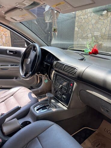 vito güzgü: Volkswagen Passat: 1.8 l | 2002 il Sedan — 2