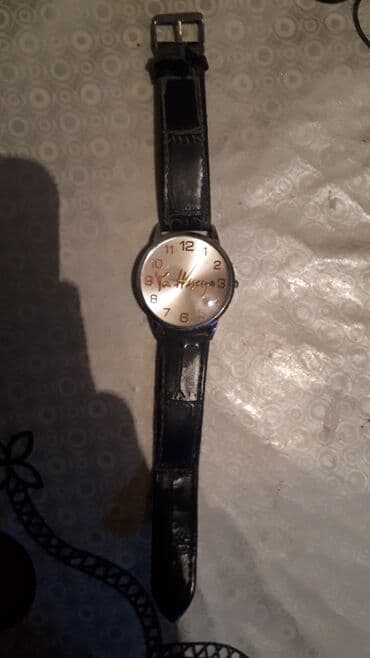 Saat kəmərləri: Məhsul: Klassik analoq qol saatı - Korpus: dairəvi metal korpus - — 1