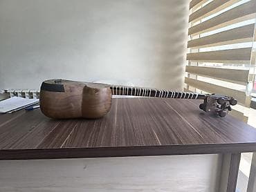 Musiqi alətləri: Professional tardı.Tarın ümumi görünüşüdə əladı.Tarın səsi və — 8