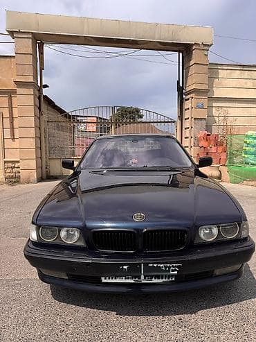 tesla model s: BMW 7 series: 3.5 l | 1996 il Sedan — 1