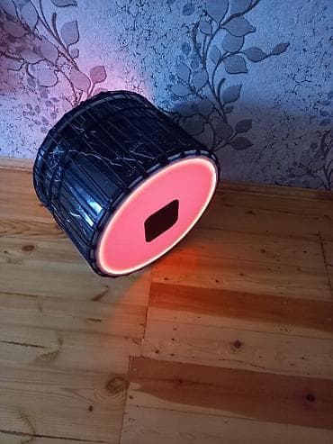 Işiqli davul - Kənar konstruksiya: Möhkəm hörgülü iplə sıx bağlama