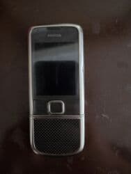 сотовый телефон fly ff248 grey: Nokia 8000 4G, цвет - Серый — 1