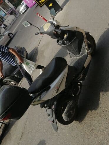 moped akumulator: Moon — 1