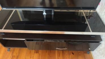 стеклянный журнальный стол: Б/у, Прямой ТВ стенд, С полками, Стеклянный — 1