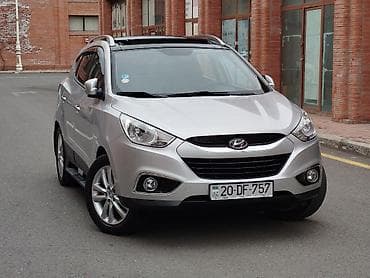 kia caren 2012: Hyundai ix35: 2 l | 2011 il Krossover — 1