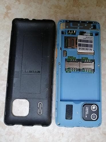 philips xenium e570: M-HORSE M5606 düyməli mobil telefon Telefon yaxşı vəziyyətdədir — 5
