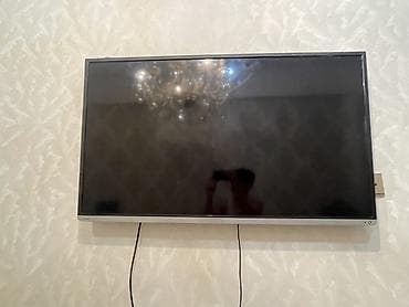 Divar asılqanlı LED televizor - Ekran: təxminən 40–43 düym, nazik