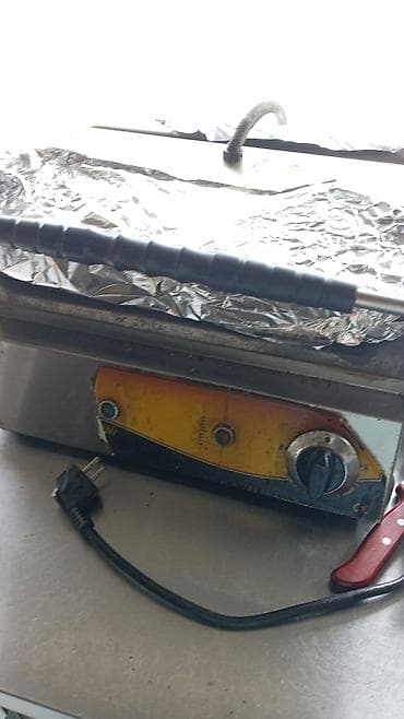 Restoran tosterləri: Toster aparatı satılır. Qiyməti 150 manat — 1