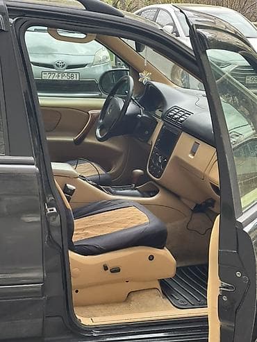 Mercedes-Benz ML 320: 3.2 л | 1998 г. Внедорожник — 7
